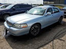 Image result for Light Ice Blue 2009 Town Car