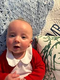 Our little ham is 4 months old (plus two days bc Mom forgot my Vday  pictures). Mom and Dad are smitten over our sweet little boy.