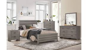 This chic dresser includes a bourbon end, three drawers, and an built in energy outlet for charging your units. Kern Rustic Gray Bedroom Furniture