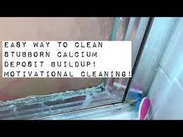How To Clean Calcium Deposit Build Up Off Faucets Shower Glass Doors And Tile Grout Youtube In 2021 Glass Shower Glass Shower Doors Tile Grout
