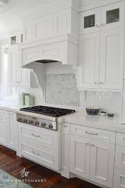 An elaborate kitchen backsplash complements the room's decor and adds to the aesthetic appeal of the kitchen. Cooktop Backsplash Border Tiles Design Ideas