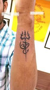 Shiva tattoo design on back center; Small Trishul Tattoo Done At Big Guys Tattoo Studio Shiva Tattoo Tattoos Trishul Tattoo Designs