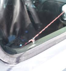 The door lock handle will start to move once the hook has grabbed it. Rhob7awy1b Xwm