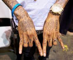 If you enter a tattoo shop and see hundreds of designs which usually encompass the walls and you don't have an idea, you will probably become. Wiz Khalifa S 9 Tattoos Their Meanings Body Art Guru