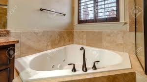Or project coming up youve got a small bathroom. Panorama Small Triangular Fitted Corner Bathtub With Beige Tiled Stock Photo Picture And Royalty Free Image Image 137684475
