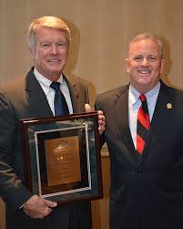 Oklahoma Bar Association honors Reid Robison with Neil E. Bogan  Professionalism Award