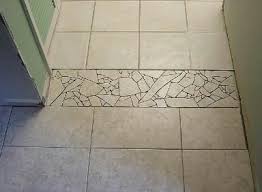 Mosaic Tile As Transition Good Way To Use Broken Pieces Of Tile Mosaic Flooring Tile Floor Flooring