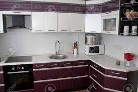 The real feature of the room, though, is the exquisite set of chromed glass orb lights above which add warmth without being overbearing. Modern Kitchen Set Up In The Flat Stock Photo Picture And Royalty Free Image Image 73187323