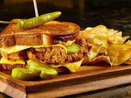 While your chicken is frying, whisk together olive oil, cayenne, brown sugar, paprika, chili powder and garlic powder. Hot Chicken Cheese Sandwich