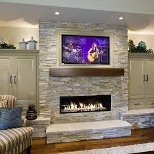 We used natural stone veneer for the wall and fireplace matched with a dark grey paver for the patio. 10 Fabulous Designs For Your Outdoor Fireplace Arch2o Com