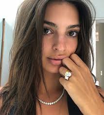 The other two make up the parts that wrap around the front of the stone. Emily Ratajkowski Replaces Paper Clip Engagement Ring With Double Stone Stunner The Jeweler Blog