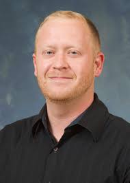 Dr. Joshua Reece Earns Best Presentation Award at Conference