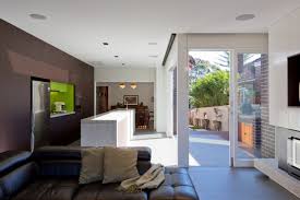 The next step we took to finish the back of our kitchen island was to stain the trim to match our cabinets. Dark Brown Comfy Sofa Along With Clear Colored Kitchen Island Made From Marble Hupehome