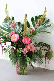 A Miami Style Teenager S Birthday Party Flamingos Pineapples And Balloons A Go Go Flower Arrangements Teenage Birthday Party Tropical Party