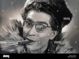 Comedy cigar smoking hi-res stock photography and images