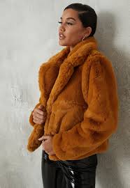 Shop our coats for women from winter coats to denim jackets, waterproof & teddy coats, stay warm without compromising on your outfits. Petite Camel Shawl Collar Faux Fur Coat Missguided