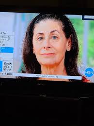 QVC TV show features woman with distinctive eyebrows
