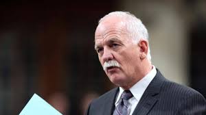 Vic Toews defends approval of filmed immigration raids for reality TV show 