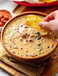 Black Bean Dip With Cream Cheese Rotel This Easy Homemade Queso Dip Is Loaded With Warm Melty Cheddar Pepper Jack Beef Pale Ale Rotel Tomatoes Black Beans In 2020 Milk Recipes Bacon Dip Veggie Recipes