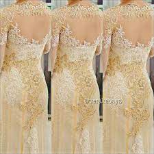 Kebaya perpaduan tradisional jawa dengan kain ulos; Kebaya Pengantin Batak Warna Gold Serba Pengantin
