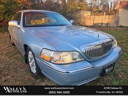 Image result for Light Ice Blue 2009 Town Car