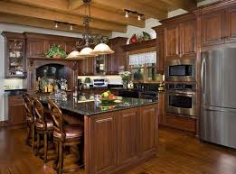 Photos Of A Florida Log Home Sunshine State Of Mind Log Home Kitchens Dark Countertops Log Cabin Kitchens
