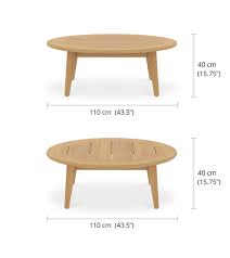24 inches long by 24 inches wide. Piedra Round Coffee Table