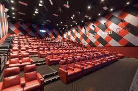 There is no $1 service fee when purchasing a ticket at the theatre. Our Work Cinema Acoustics