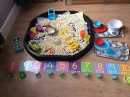 Lovely set up. Popcorn in tuff spot with lots of Maths provocations | Math  activities, Kindergarten math, Education math