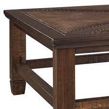 Ralph lauren marseilles wicker luggage trunk coffee table large internal storage. Rectangular Cocktail Table With Nailhead Accents Brown Overstock 32083952