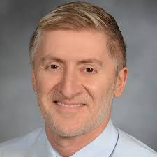 Dr. Adam E. Vella, MD