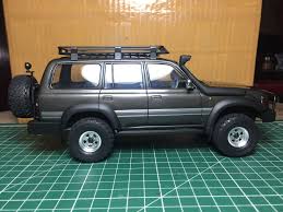 Tamiya 1/24 toyota land cruiser 80 w/sports options model kit 24122 tam24122made in japankey features highly accurate static display model complete engine detail sport package optional parts completely detailed exterior and interior realistic rubber like tires detailed pictorial instructions the box is a little tattered and the decals are no longer good, due to old age (they shrank).this kit. Tamiya Land Cruiser 80 Cheap Toys Kids Toys