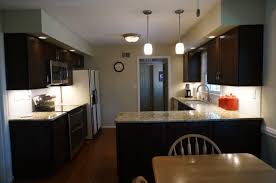 Merillat Classic Cabinetry Cherry With Pecan Stain Full Overlay Tolani Flat Panel Door Style 5 Piece Drawer Merillat Cabinets Sweet Home Cabinet Accessories