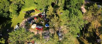 Kick back and relax with a tubing or canoe trip on the peshtigo river; Apple River Family Campground Somerset Wisconsin Camping Tubing