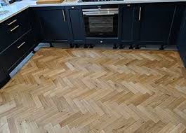 curved parquet gives kitchen floor the