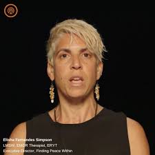 Elisha Fernandes Simpson is a licensed social worker, EMDR therapist, and  trauma-informed yoga instructor who dedicated herself to supporting young  women to reclaim their voices, build resilience and thrive. She has captured