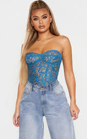 Windsor has a stunning collection of women's bustiers and corset tops to adore for summer 2021! Petrol Blue Sheer Lace Structured Corset Top Prettylittlething