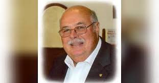 George E. Tuttle Obituary