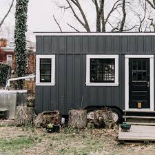 The swatch initially looked to have a purple undertone but up on the house it doesn't at all. The Pros And Cons Of Dark Exterior Paint Apartment Therapy