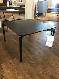 This round piece is built from sturdy squared iron with a wide round base. Radius Square Coffee Table Floor Model Alchemy Collections