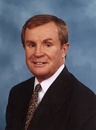 John Nelson; halted hostile takeover, aided TJX expansion