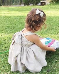 a imagem pode conter 1 pessoa grama crianca arvore atividades ao ar livre e natureza baby knitting patterns babaanne dantelleri elbise dikis rehberleri