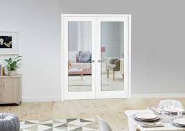 French doors french doors bring an elegant, traditional style to your space, with panes of glass to allow light to filter through from the rooms they connect. White Pattern 10 Glazed Internal French Doors Clear Glass