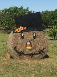 Mr Scarecrow From A Round Hay Bale Fall Festival Decorations Hay Bale Fall Decor Fall Yard Decor