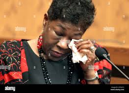 Florence Bray, the mother of Crystal Dozier, wipes tears during her  testimony during the second day of Anthony Sowell trial at the Cuyahoga  County Justice Center in Cleveland