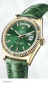 Rolex Day Date 36 Mm In Yellow Gold Fluted Bezel Green Dial And Leather Strap Rolexofficial Luxur Rolex Diamond Watch Rolex Day Date Rolex Watches For Men