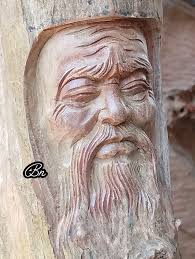 Carving a shoveler hen decoy