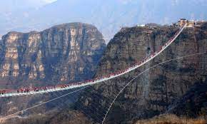 At the ticket office they told us that the bridge was open but that the cableway to the bridge is still under construction. Chinese Province Closes All Glass Bridges Over Safety Fears China The Guardian