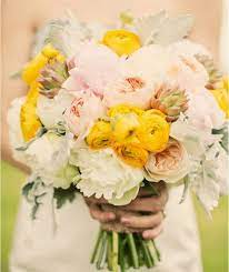 The beautiful ranunculus flower is an excellent choice for wedding bouquets because it is available in a variety of colors including white, yellow, orange, pale and apricot. Most Beautiful Bouquet Of Flowers In The World Yellow Bridal Bouquets Spring Wedding Flowers Beautiful Bridal Bouquet
