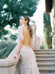 How To Add Old World Charm To Your Outdoor Garden Wedding Plain Wedding Dress Garden Wedding Dresses Wedding Dresses Unique